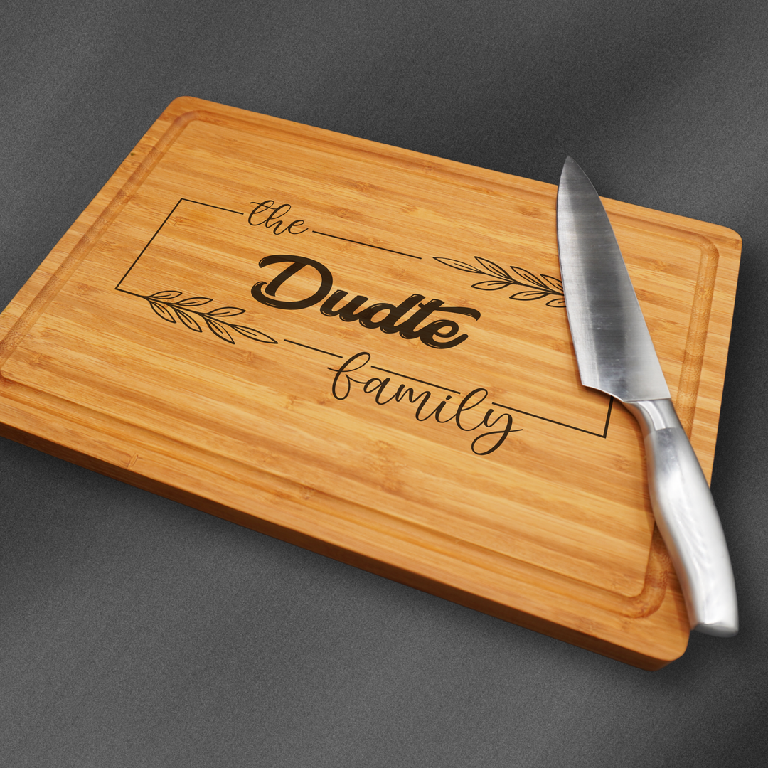 Large personalized cutting board engraved in the center with a family name. Perfect for housewarming gifts.