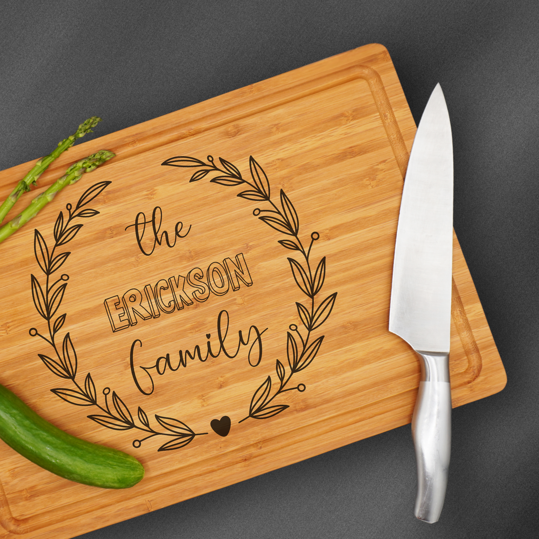 Large Cutting board that is laser engraved with a family name.