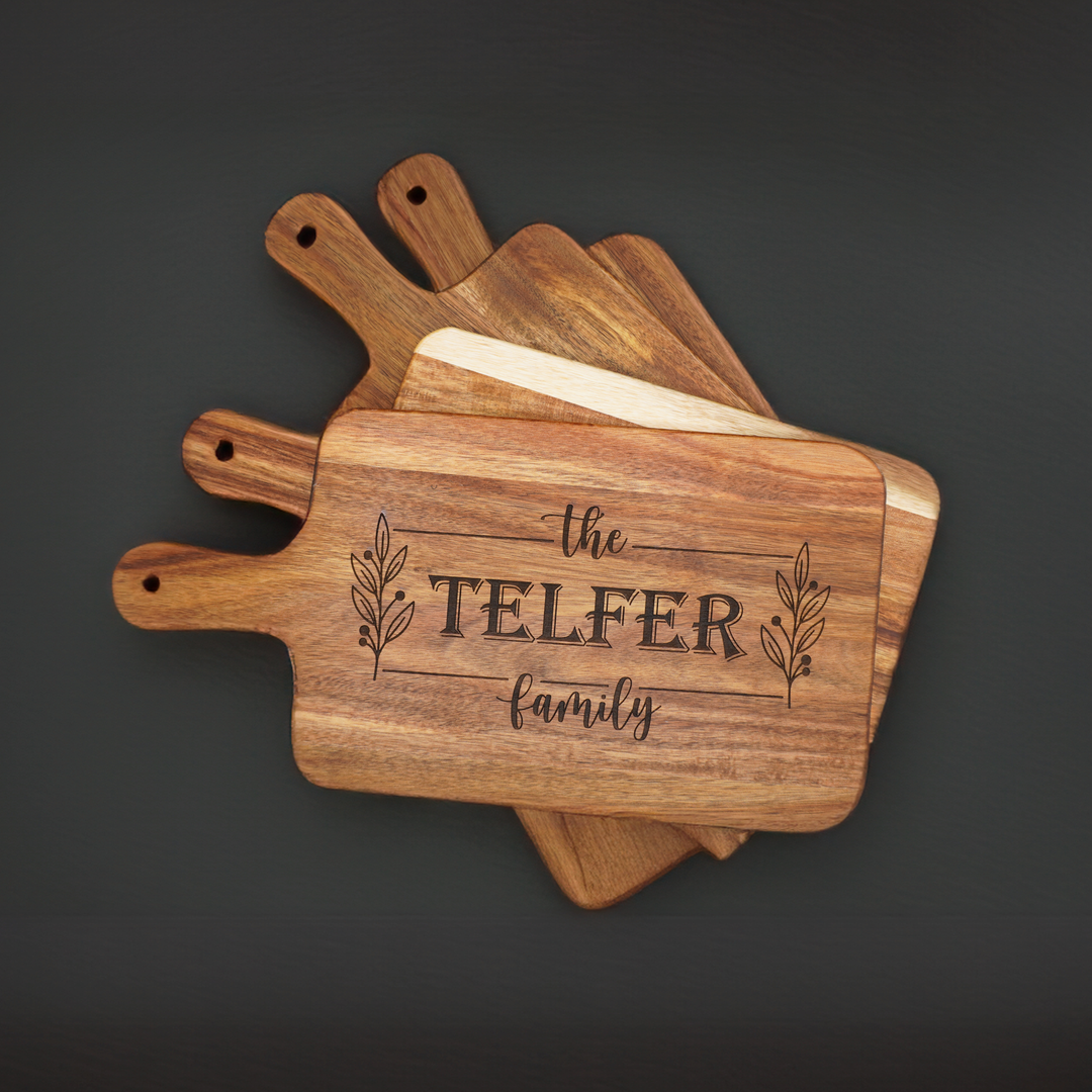 stacked personalized cutting boards. Perfect gift for weddings, anniversaries or housewarming.