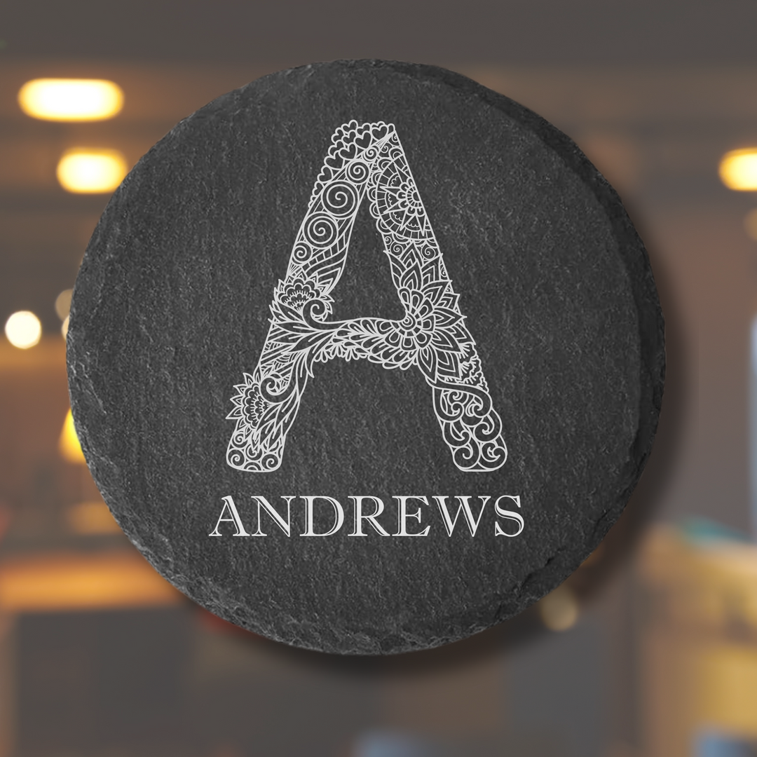 Custom drink coaster, featuring personalized laser engraving with a family name and stylish design