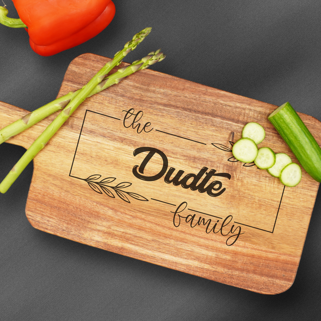 Large personalized cutting board engraved in the center with text. Perfect for housewarming gifts.