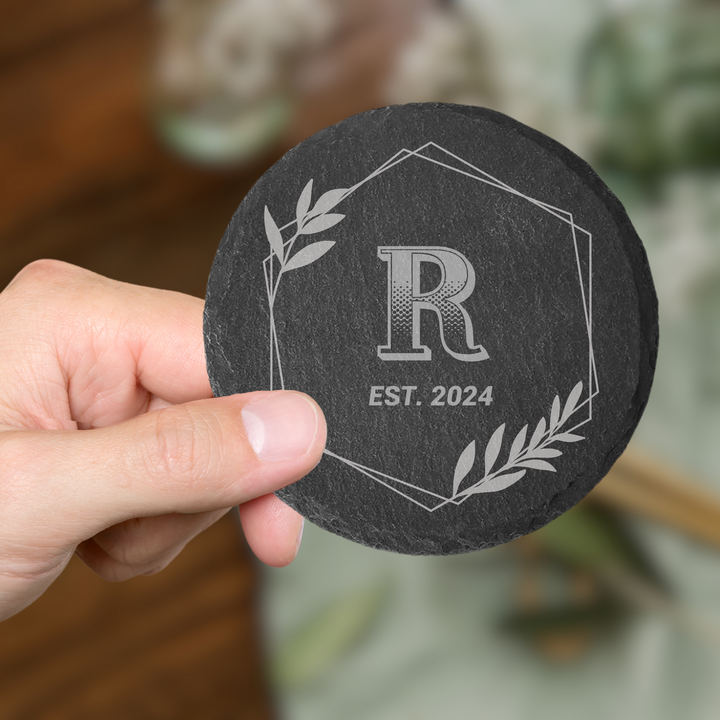 Personalized wooden wedding drink coaster, featuring custom engraving with the couple's names and wedding details