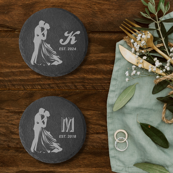 Engraved wooden wedding drink coaster, personalized with the couple's names and decorative wedding elements