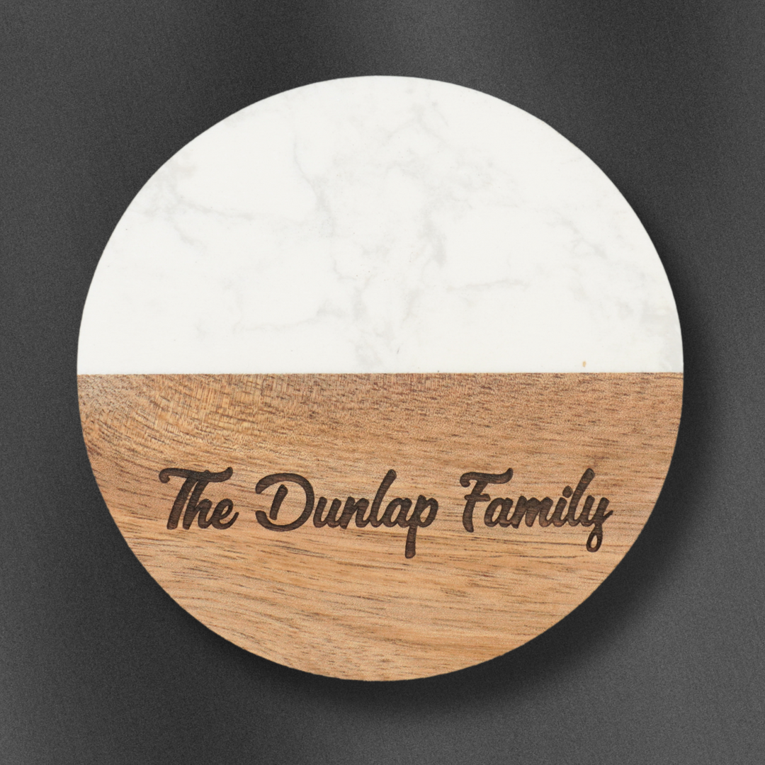 Granite and Wood coasters with a family engraving on it.